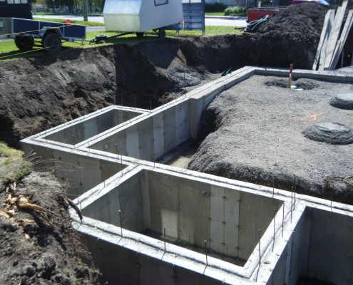 Maison neuve, multiplex neuf, mur de fondation, FEXA Entrepreneur Général Construction