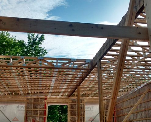 Construction maison neuve, ossature de bois, poutrelle de plancher érigée par FEXA Construction, Entrepreneur général